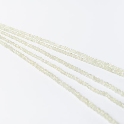 Faceted Prehnite rondelle beads with pale green hues, perfect gemstone beads for DIY jewellery making.