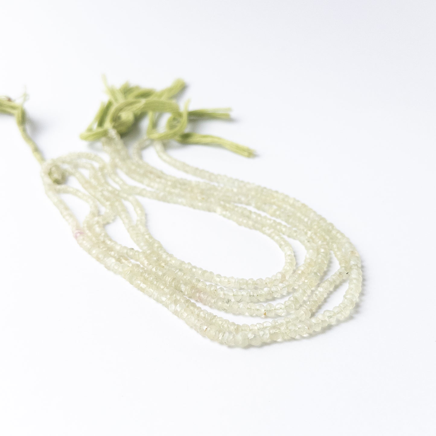 High‑quality Prehnite rondelle stone beads, shimmering faceted cut for artisan jewellery designs.
