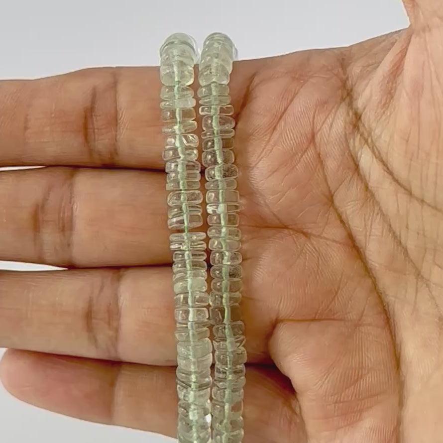 Green amethyst smooth wheel bead strand, 5.5–6.0mm gemstones on a 21cm length.