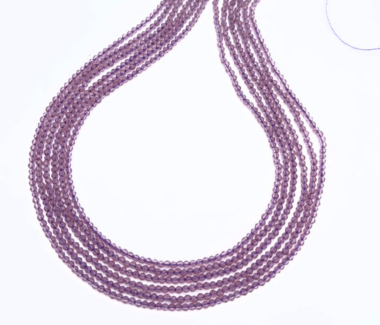 Quartz gemstone beads for DIY jewellery displayed with soft lighting and texture.
