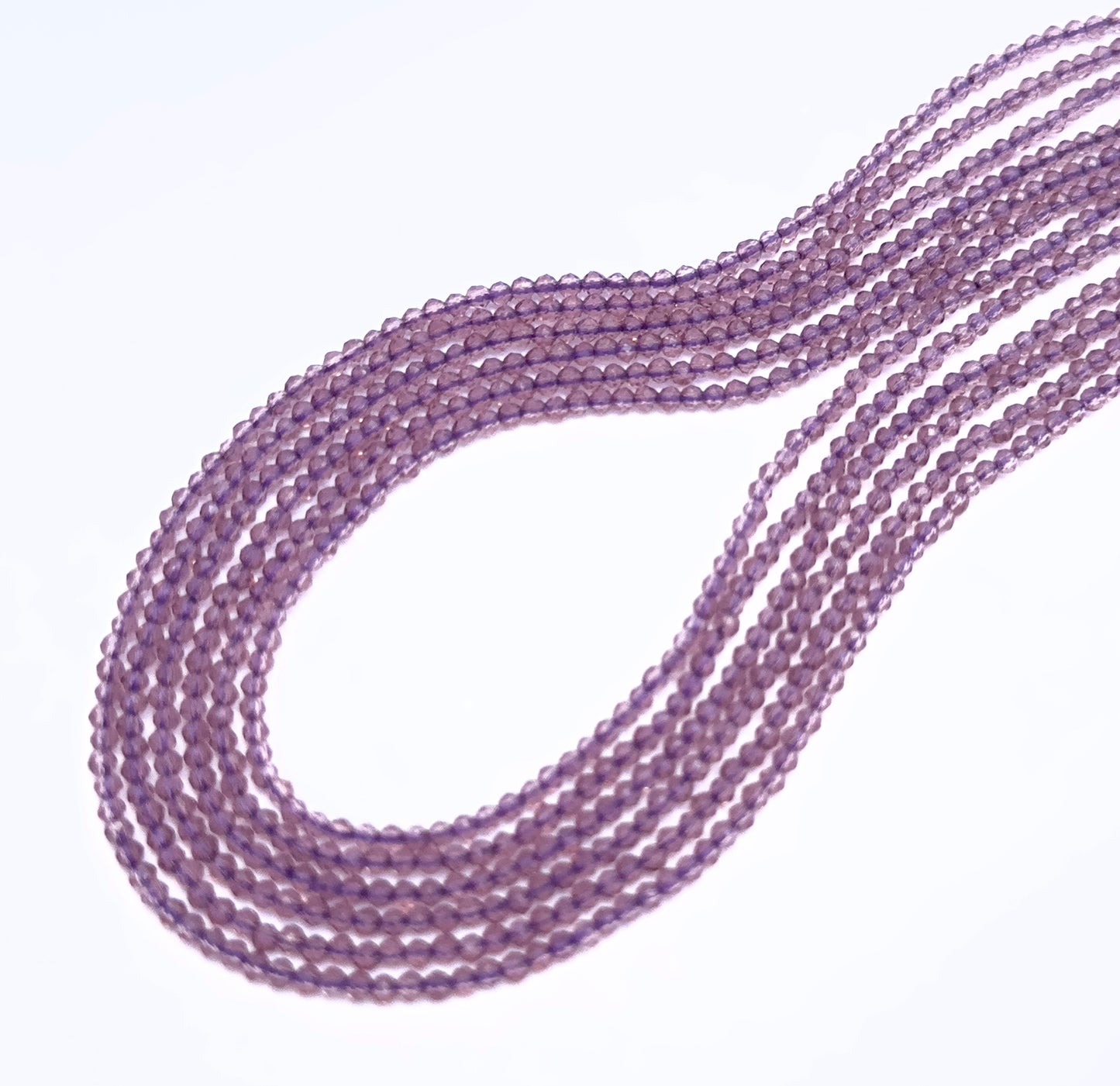 Handmade jewellery components featuring quartz faceted rondelle beads in pastel hues.