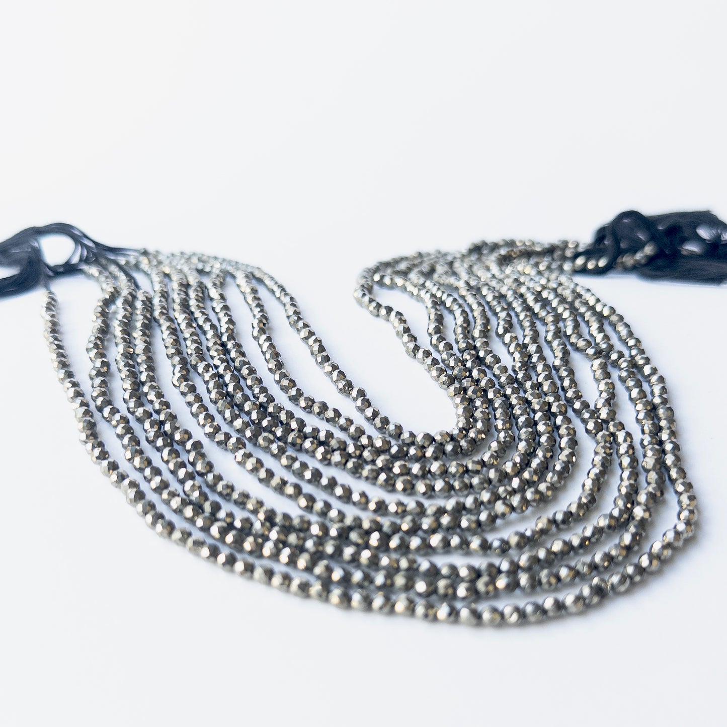 Premium Pyrite stone beads with micro faceting, perfect for elegant handmade jewellery pieces.