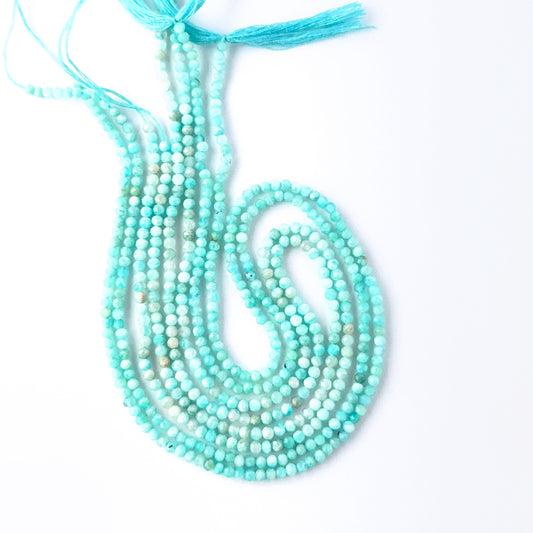 Amazonite faceted rondelle gemstone beads showing soft blue‑green tones and subtle sparkle