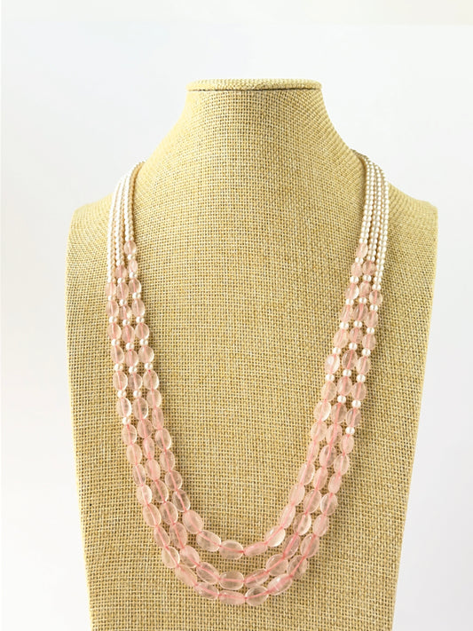 Three‑strand necklace made with smooth oval quartz and shell pearl beads in 6–8mm sizes, layered at 50–55cm with an adjustable clasp.