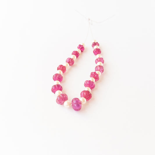 Authentic Quartz and Shell Pearl gemstone beads displaying natural clarity, pearlescent glow, and carved shaping for DIY jewellery makers.
