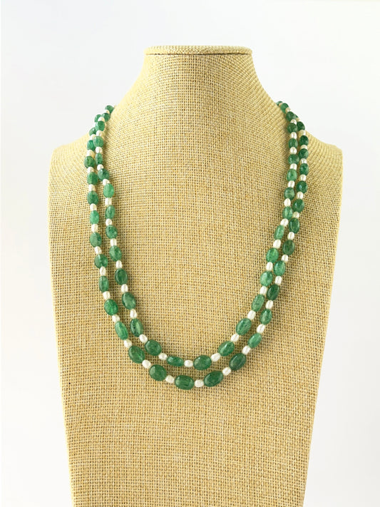 Two‑strand necklace featuring smooth oval quartz and shell pearl beads sized 7–8.5mm in 49–50cm lengths.