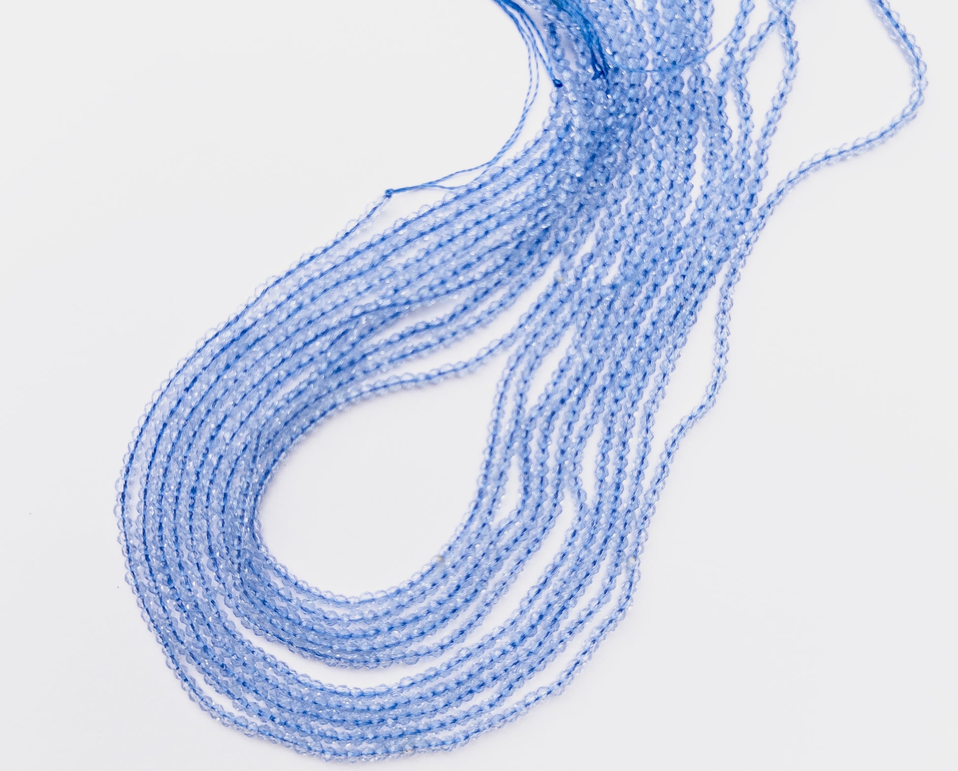 High‑quality Quartz faceted rondelles displaying bright clarity and precision‑cut shimmer.