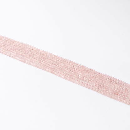 Handmade jewellery components featuring natural Quartz faceted rondelles, highlighting their bright clarity and polished finish.