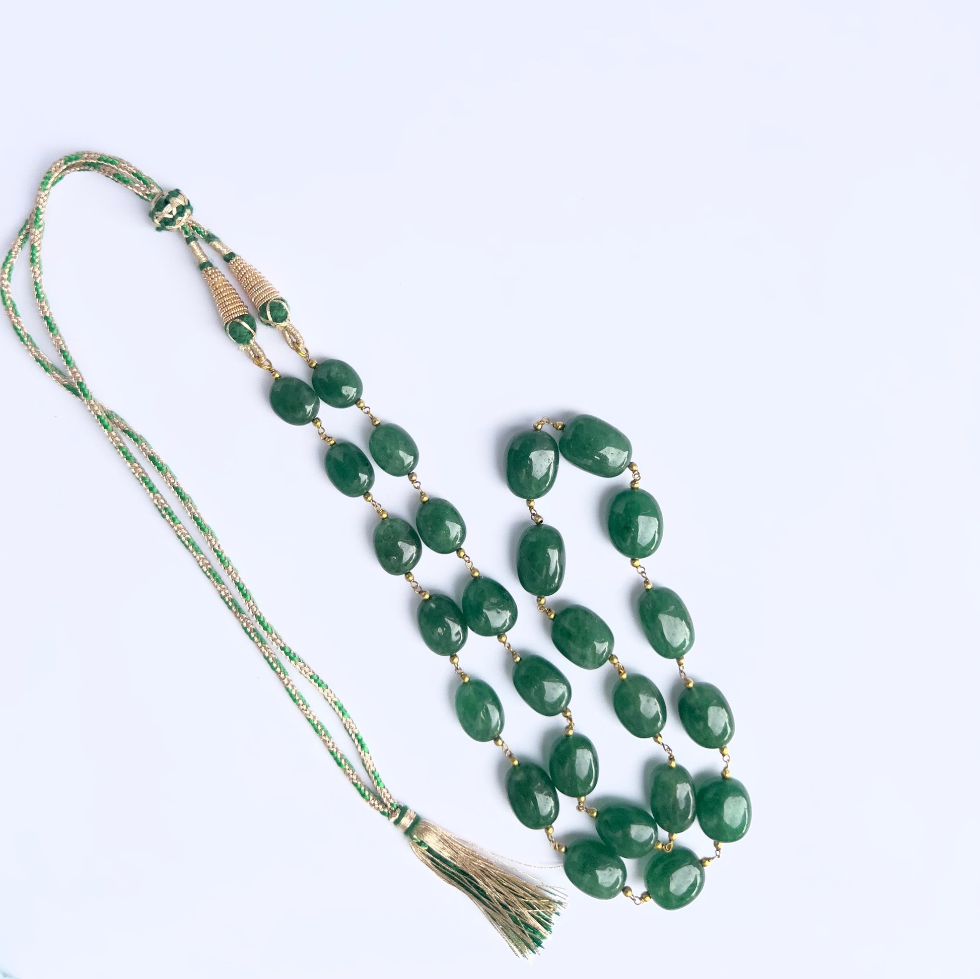 Artisan-crafted quartz necklace, tumbled gemstones, adjustable silk tassel.