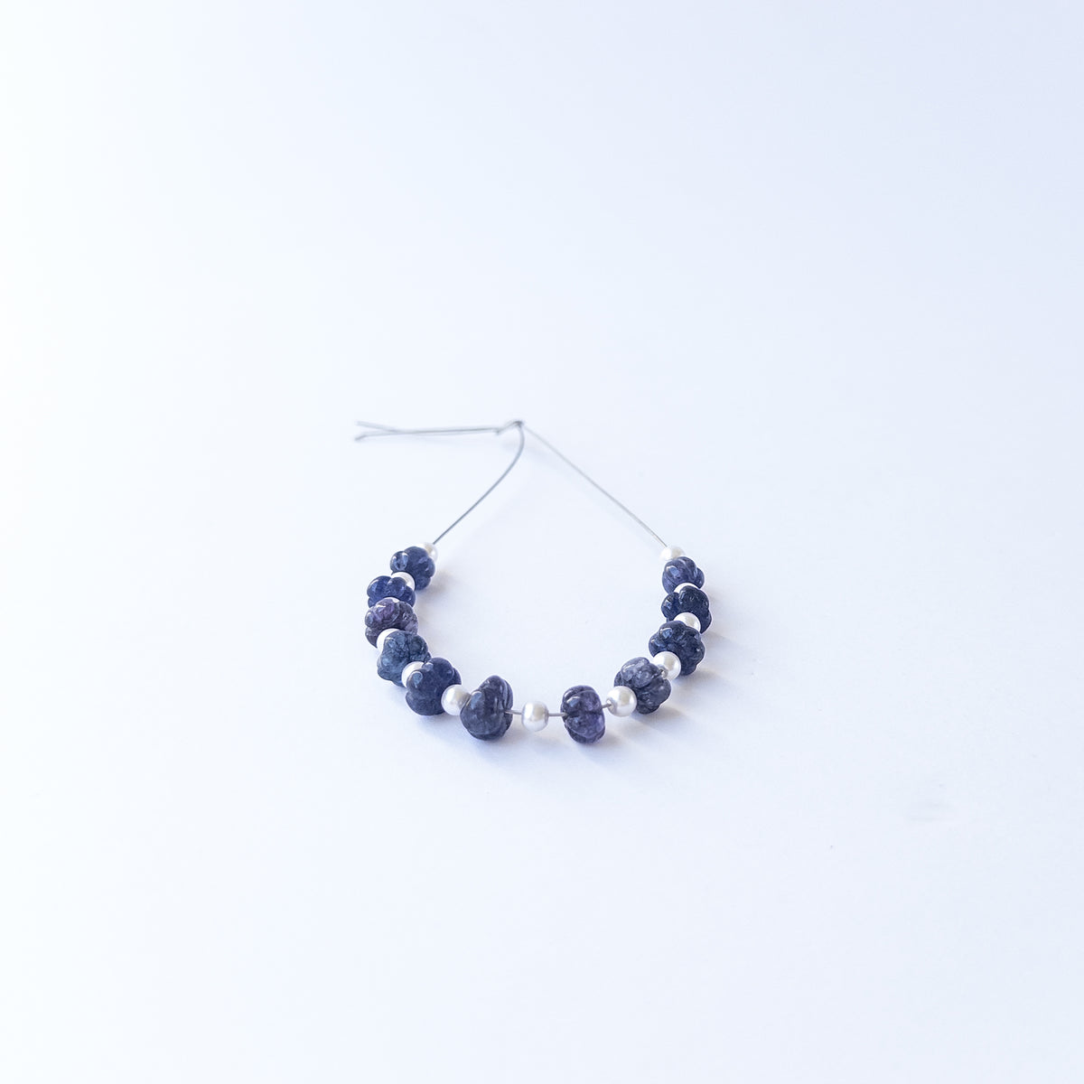 Quartz pumpkin cut gemstone beads with carved ridges, showcasing shine and clarity for handmade jewellery components.