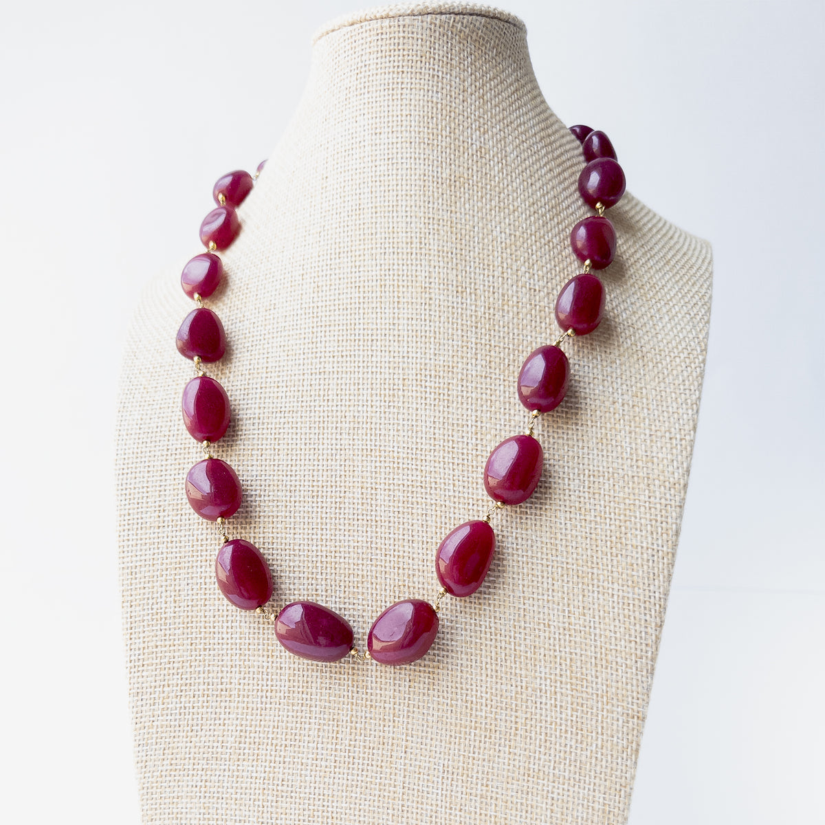 Authentic Quartz stone necklace showcasing smooth tumble gemstones individually linked for a refined handcrafted appearance.