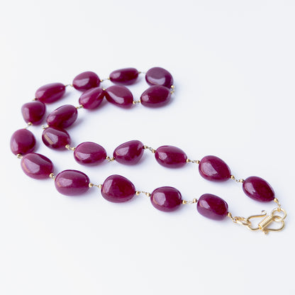 Quartz gemstone necklace designed with substantial smooth tumble beads for a sophisticated and contemporary look.
