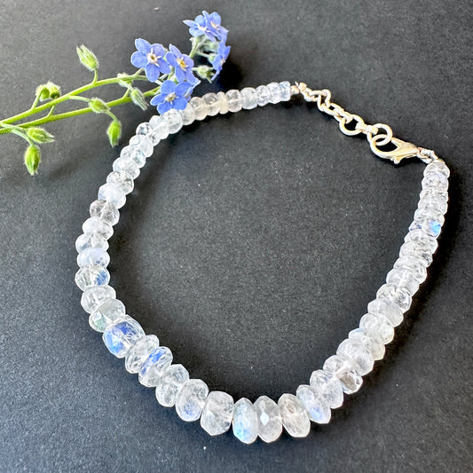 Rainbow moonstone bracelet with natural gemstone beads, faceted rondelle cut 5–6.5mm, 20cm length, 51 carats.