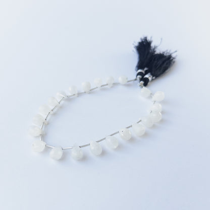 Rainbow Moonstone faceted briolette beads with natural glow, perfect for DIY jewellery makers using gemstone beads.