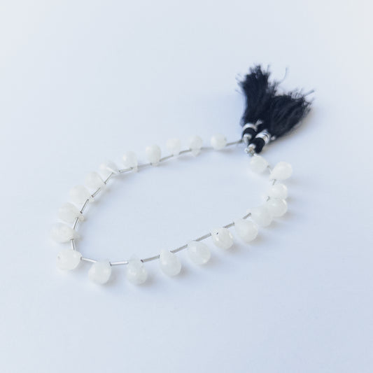 Rainbow Moonstone faceted briolette beads with natural glow, perfect for DIY jewellery makers using gemstone beads.