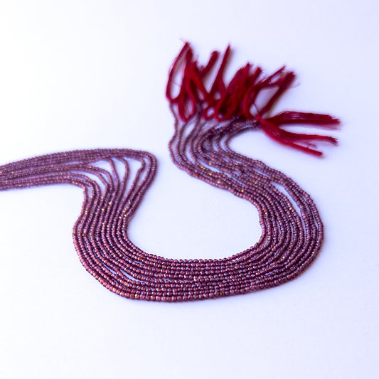 Rhodolite Garnet faceted rondelle beads in 1.9mm size, showcasing genuine gemstone sparkle for handmade jewellery.