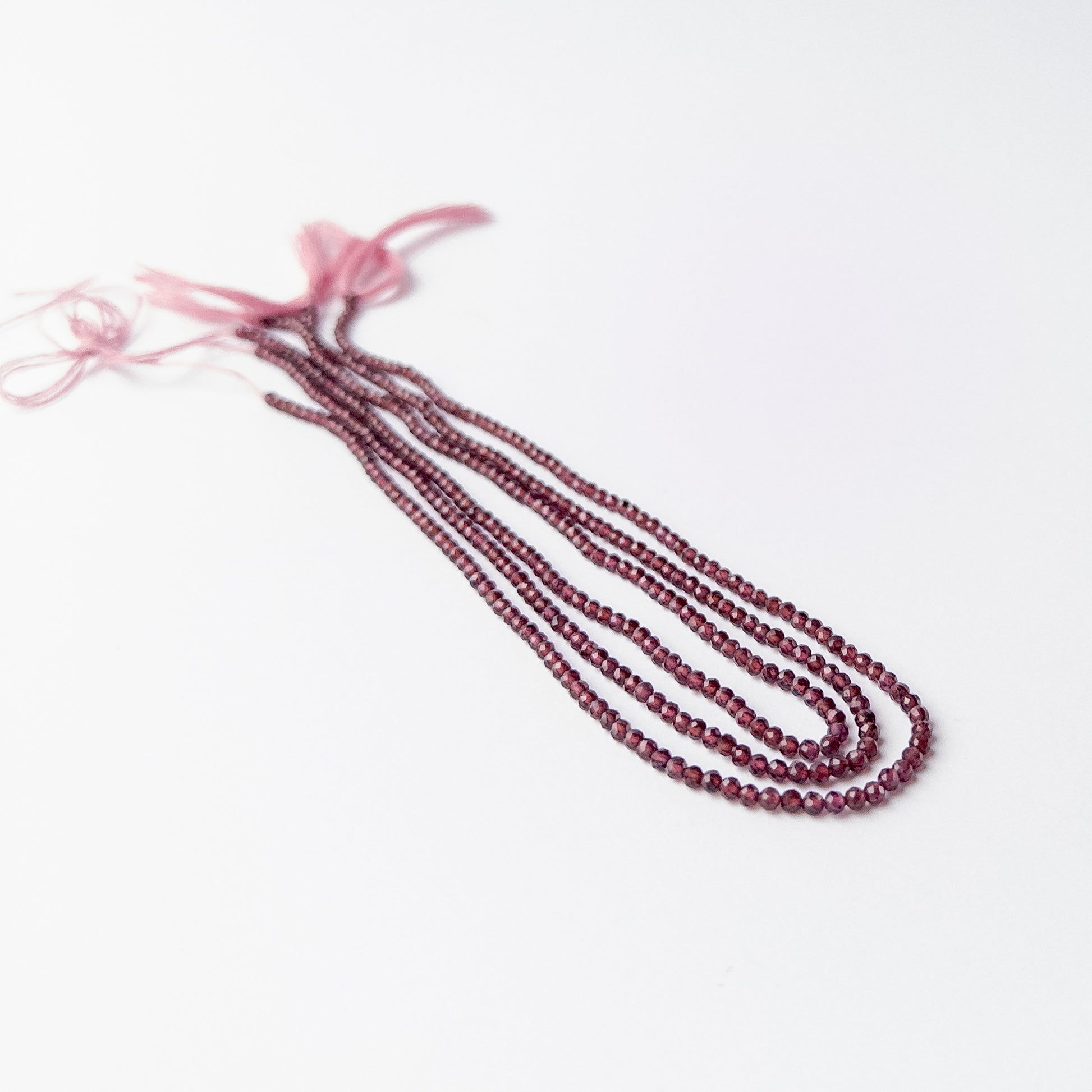 High-quality Rhodolite Garnet gemstone beads with crisp faceting for artisan jewellery designs.