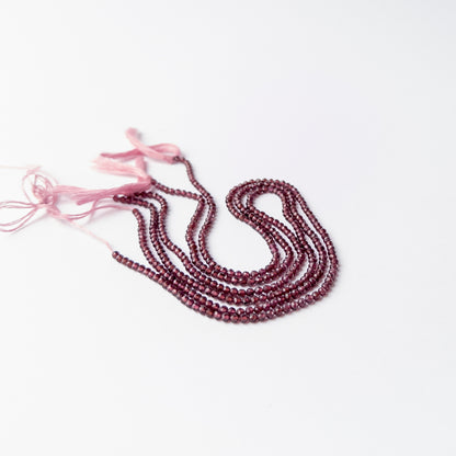 Rhodolite Garnet rondelle stone beads offering rich colour and shine for premium jewellery crafting.