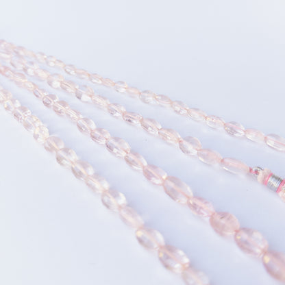 Genuine Rose Quartz gemstone beads with faceted oval cut perfect for artisan jewellery designs.