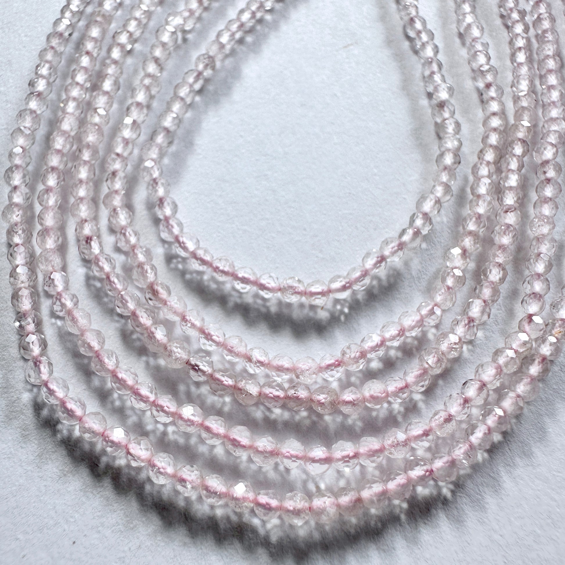 Faceted Rose Quartz beads in 2.2mm size with consistent cut and elegant pastel colour.