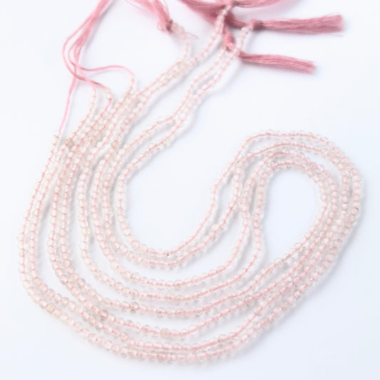 Rose Quartz faceted rondelle gemstone beads showing soft pink tones and delicate sparkle