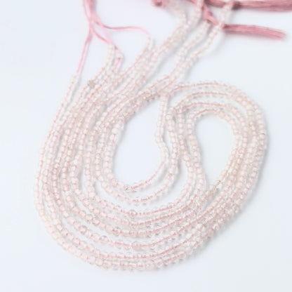 Rose Quartz rondelle beads with genuine pink colour and reflective faceting for creative jewellery designs.