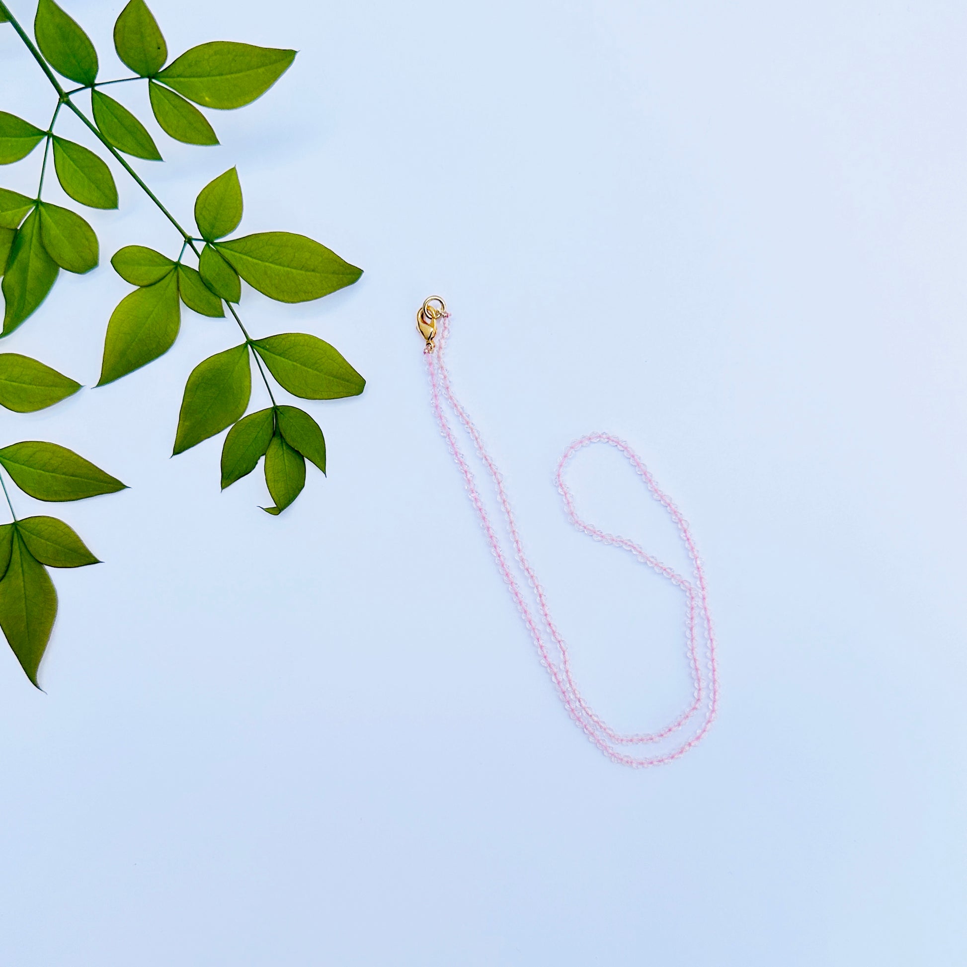 Natural gemstone necklace featuring 2.5mm faceted Rose Quartz beads.