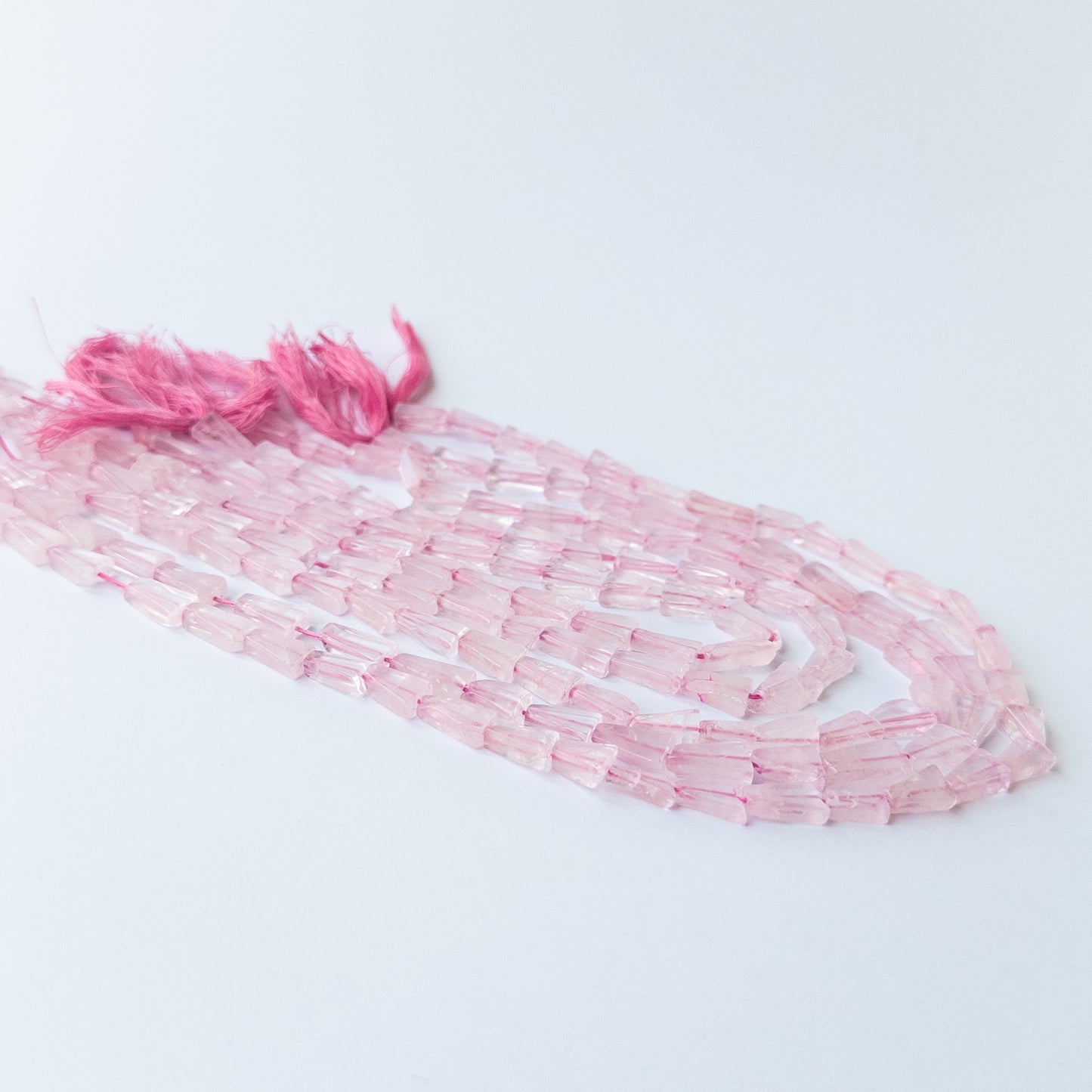 Authentic Rose Quartz tapered rectangle beads with natural pastel tones ideal for DIY jewellery making.