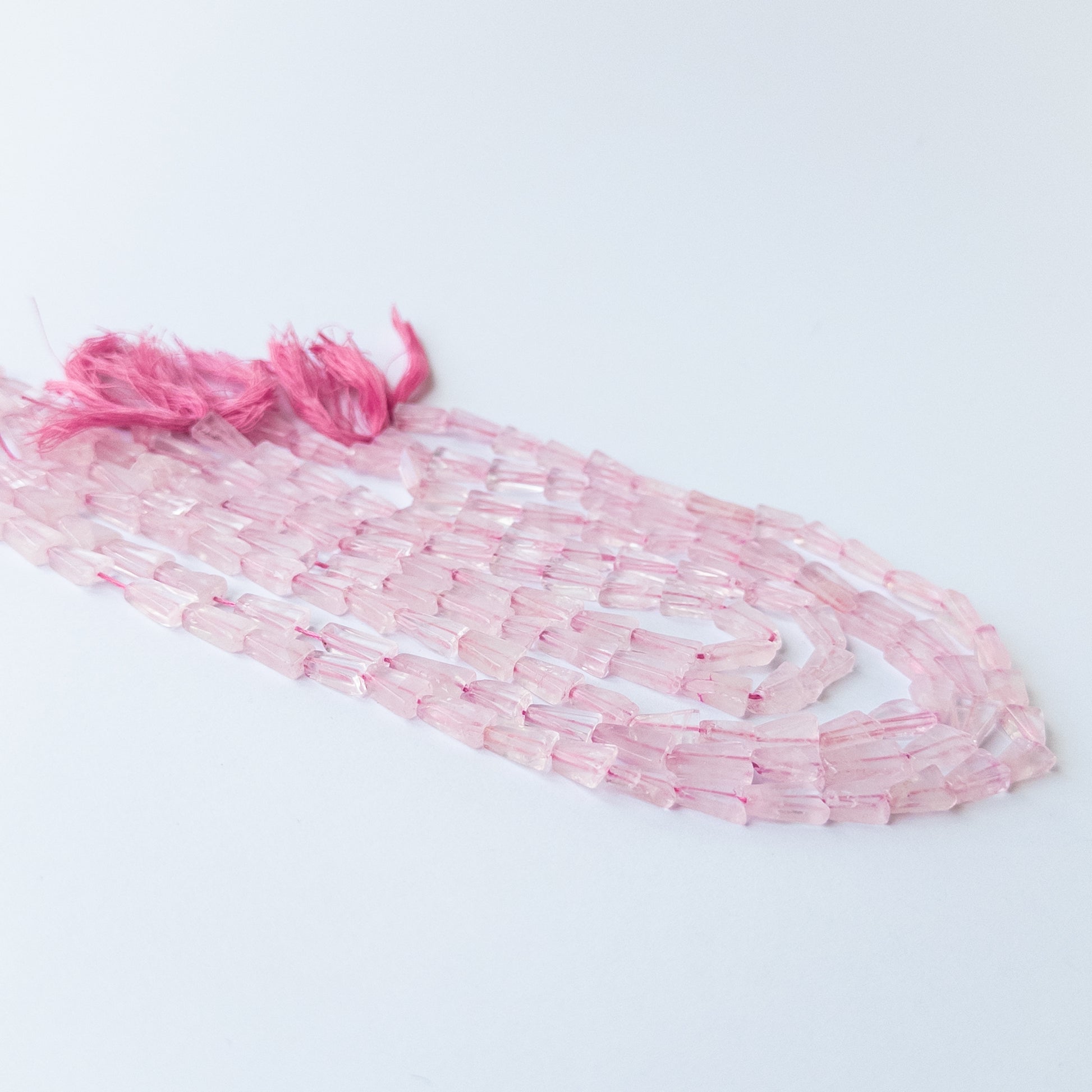 Authentic Rose Quartz tapered rectangle beads with natural pastel tones ideal for DIY jewellery making.