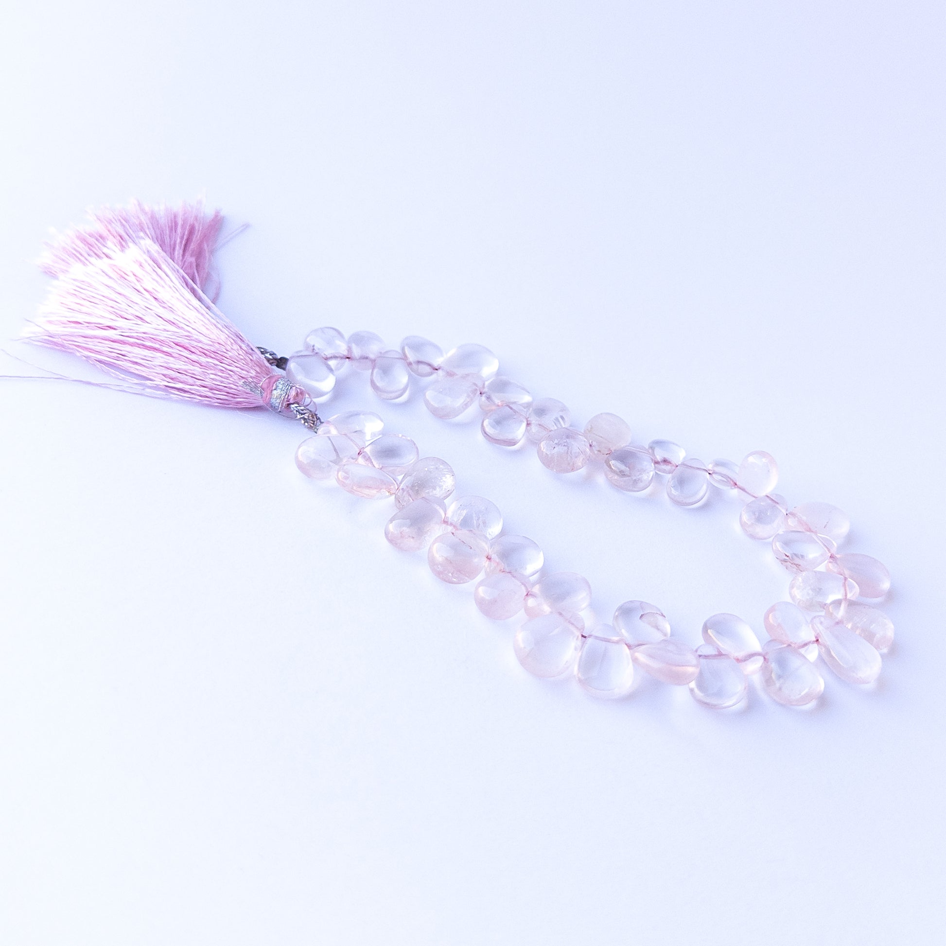 High‑quality rose quartz briolette gemstone beads with gentle shine and natural pastel colour variation.