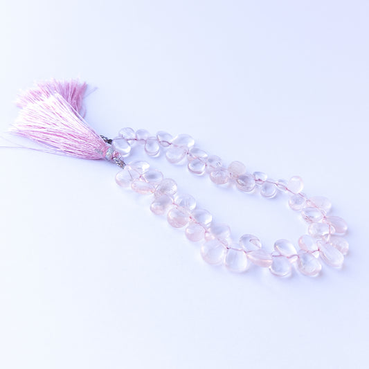 High‑quality rose quartz briolette gemstone beads with gentle shine and natural pastel colour variation.