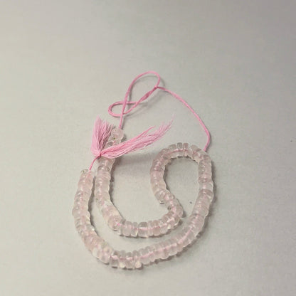 Detailed Rose Quartz 5mm wheel beads showing soft pastel hues, ideal for gemstone beads for DIY jewellery.