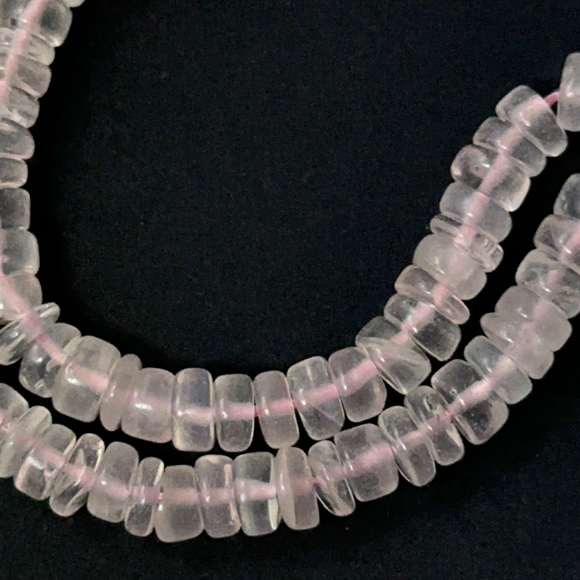 Detailed Rose Quartz 5mm wheel beads showing soft pastel hues, ideal for gemstone beads for DIY jewellery.