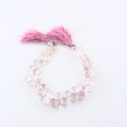 Rose Quartz faceted briolette gemstones with gentle blush colour and polished brilliance in a 20cm strand.