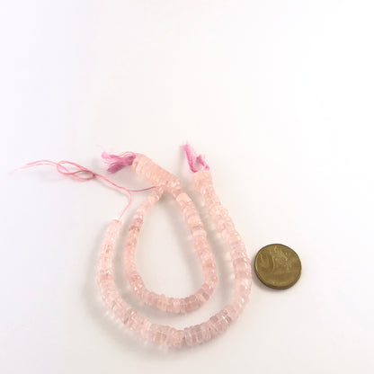 A coin is placed near Rose Quartz smooth wheel beads to show the 5.5–12mm size range.