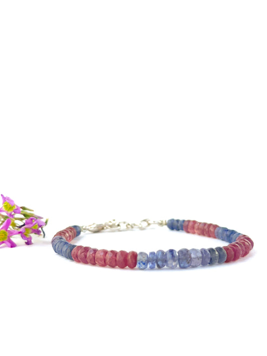 Elegant ruby and blue sapphire bracelet crafted with faceted rondelle beads.