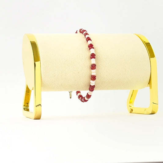 Single‑strand bracelet featuring smooth rondelle ruby and freshwater pearl beads sized 3.7–4mm in an 18cm adjustable design.