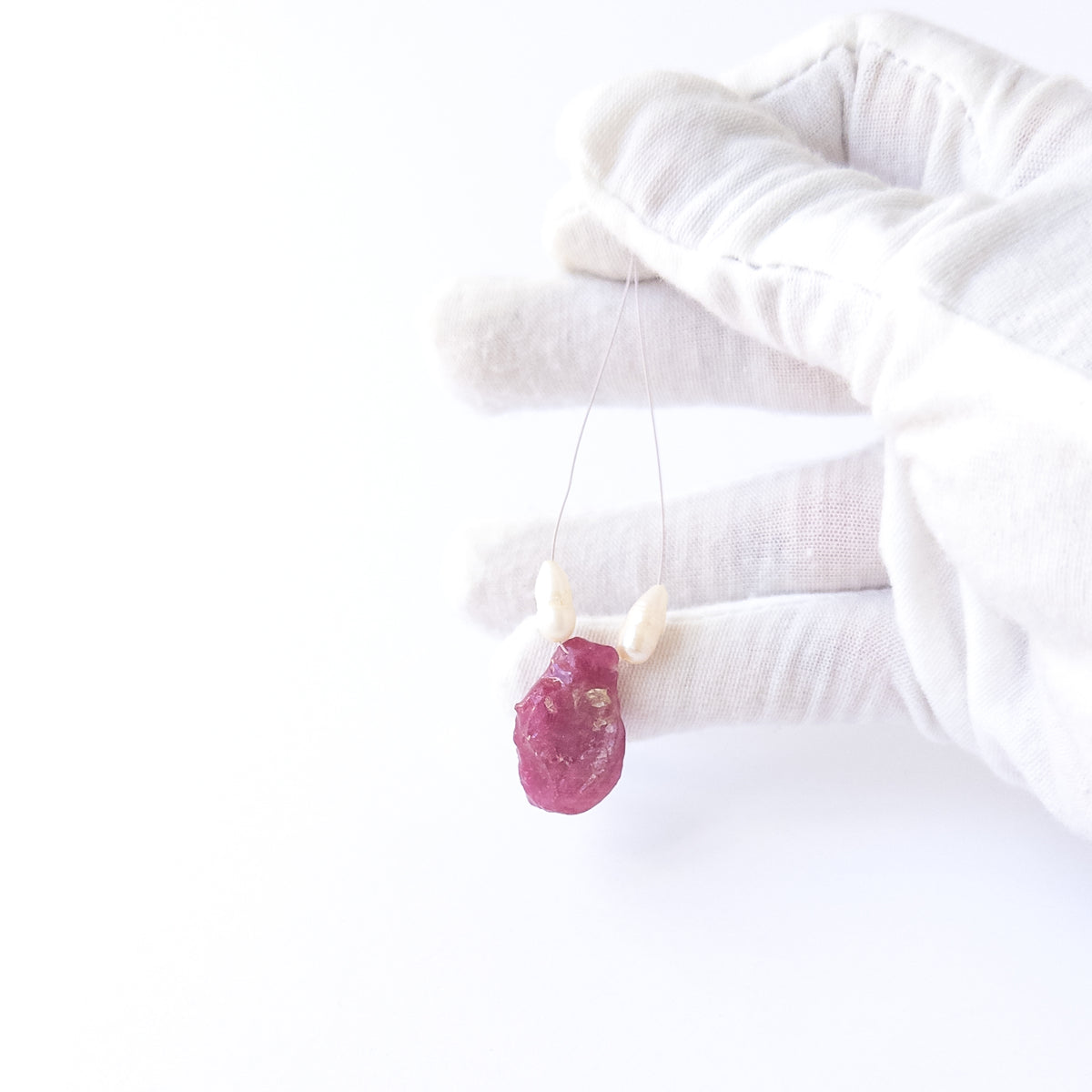 High‑quality rough‑drilled Ruby beads with polished pearls arranged for elegant handcrafted jewellery designs.