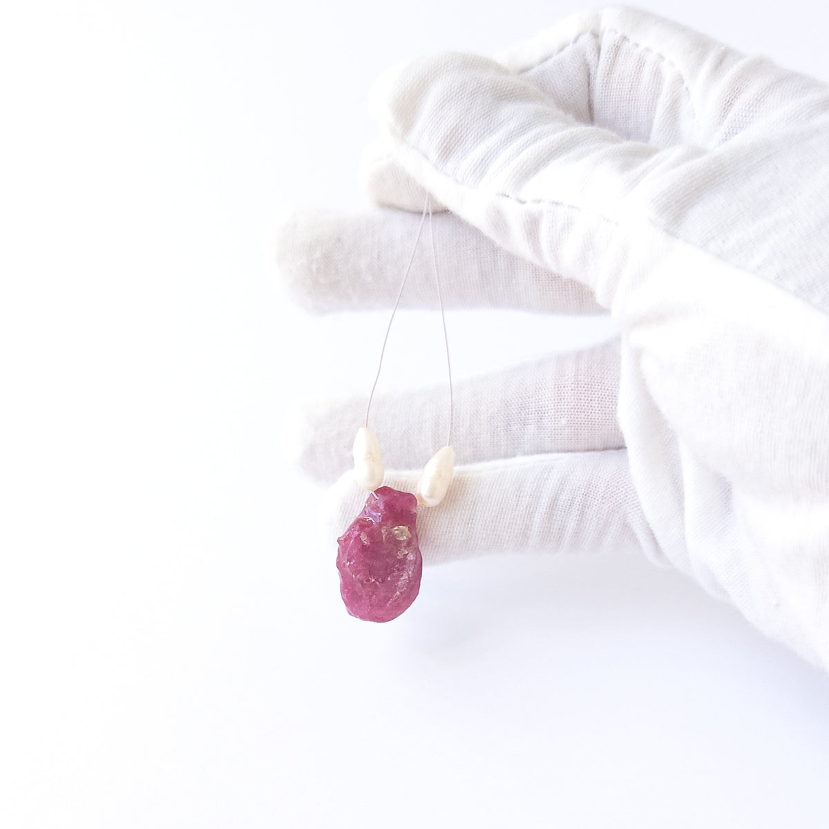 Natural Ruby gemstone beads with deep red tones and smooth Freshwater Pearls for premium stone bead creations.