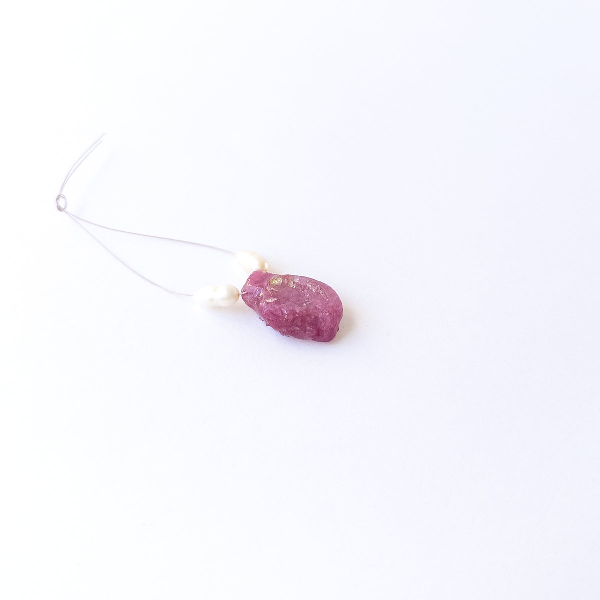 Genuine Ruby stone beads paired with lustrous Freshwater Pearls featuring organic rough‑drilled shaping for handmade jewellery components.
