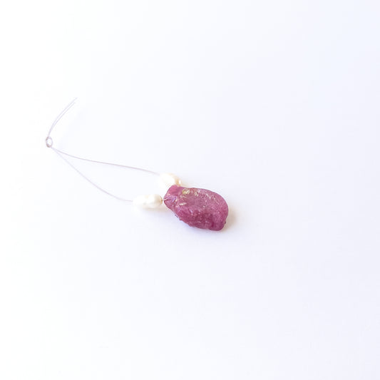 Ruby and Freshwater Pearl rough‑drilled beads showing natural texture and rich red‑white contrast in a 3‑piece set.