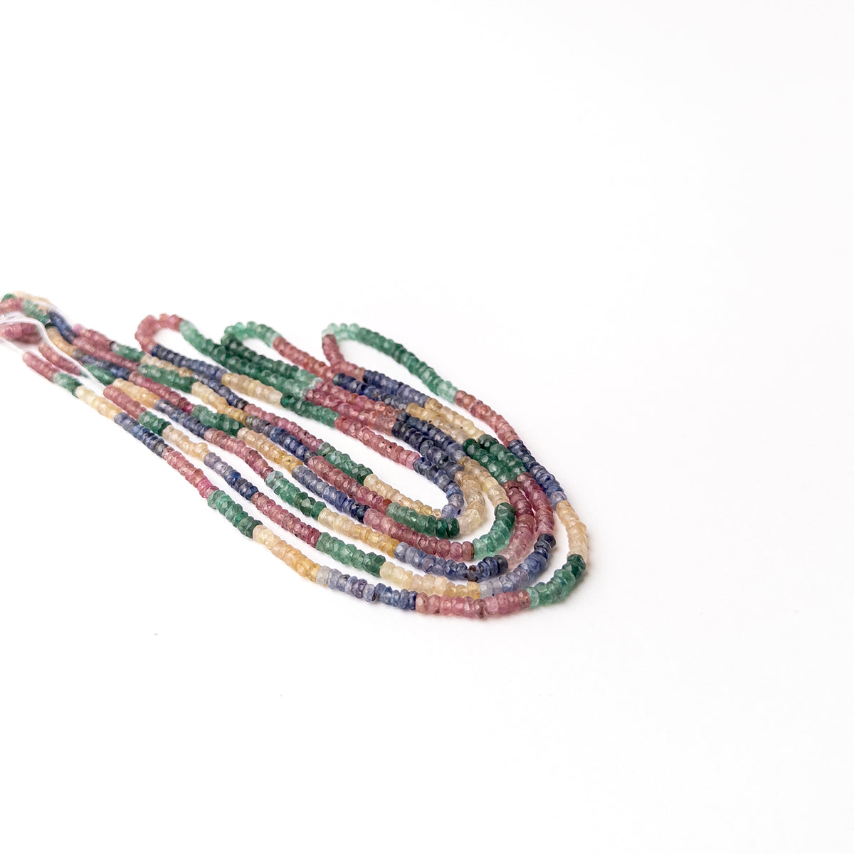 Multi precious gemstone beads for DIY jewellery combining rich red blue yellow and green gemstone tones.