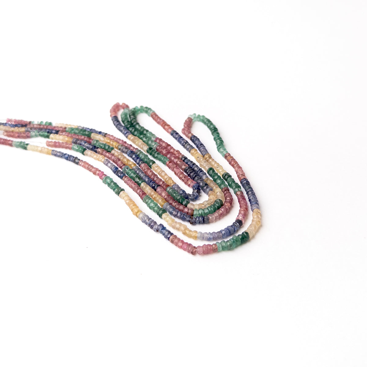 Handmade jewellery components crafted from Ruby Blue Sapphire Yellow Sapphire and Emerald faceted rondelle beads.