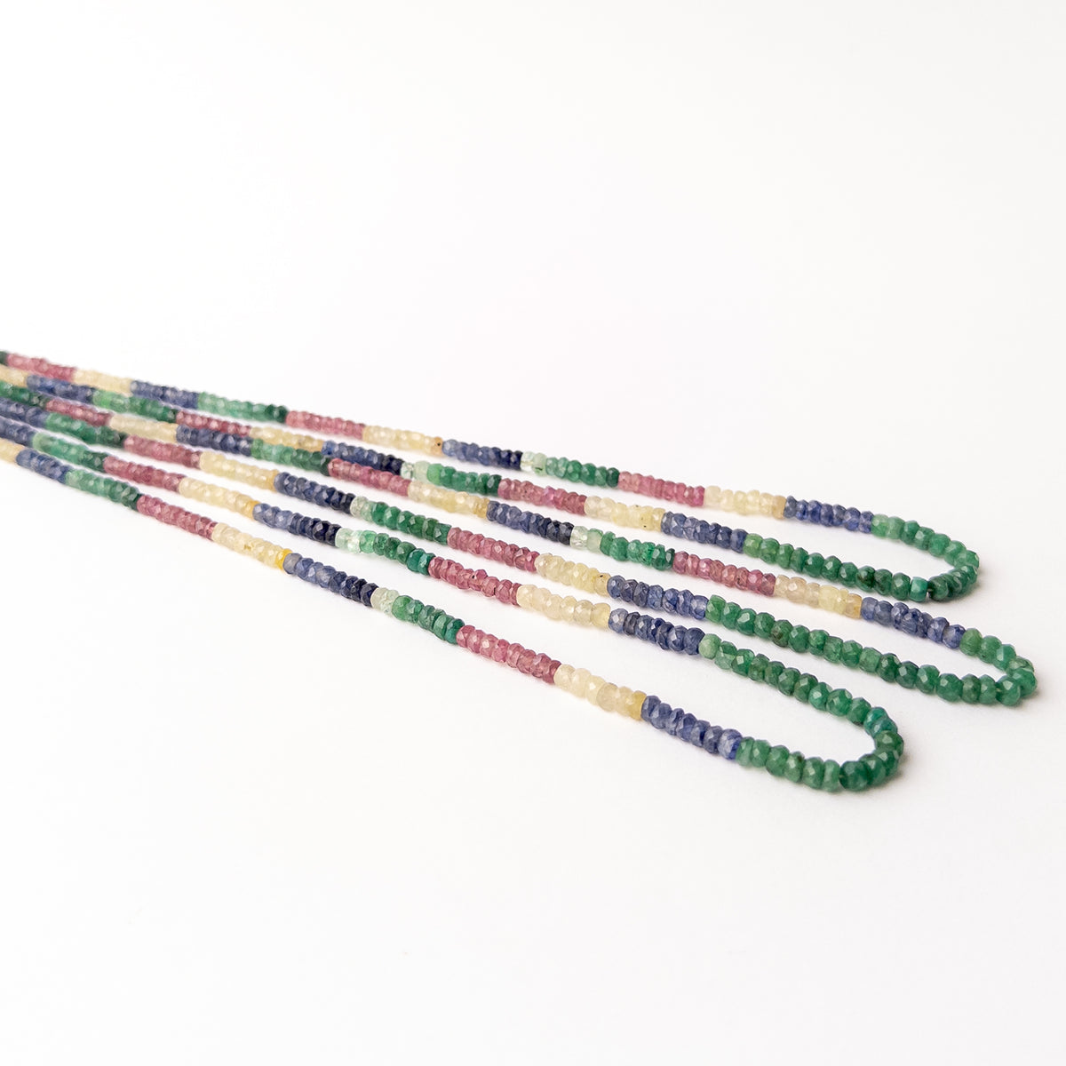Handmade jewellery components crafted from Ruby Blue Sapphire Yellow Sapphire and Emerald beads for unique jewellery designs.