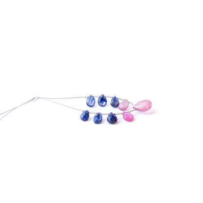 Genuine stone beads featuring Ruby and Blue Sapphire briolettes with radiant gemstone clarity.