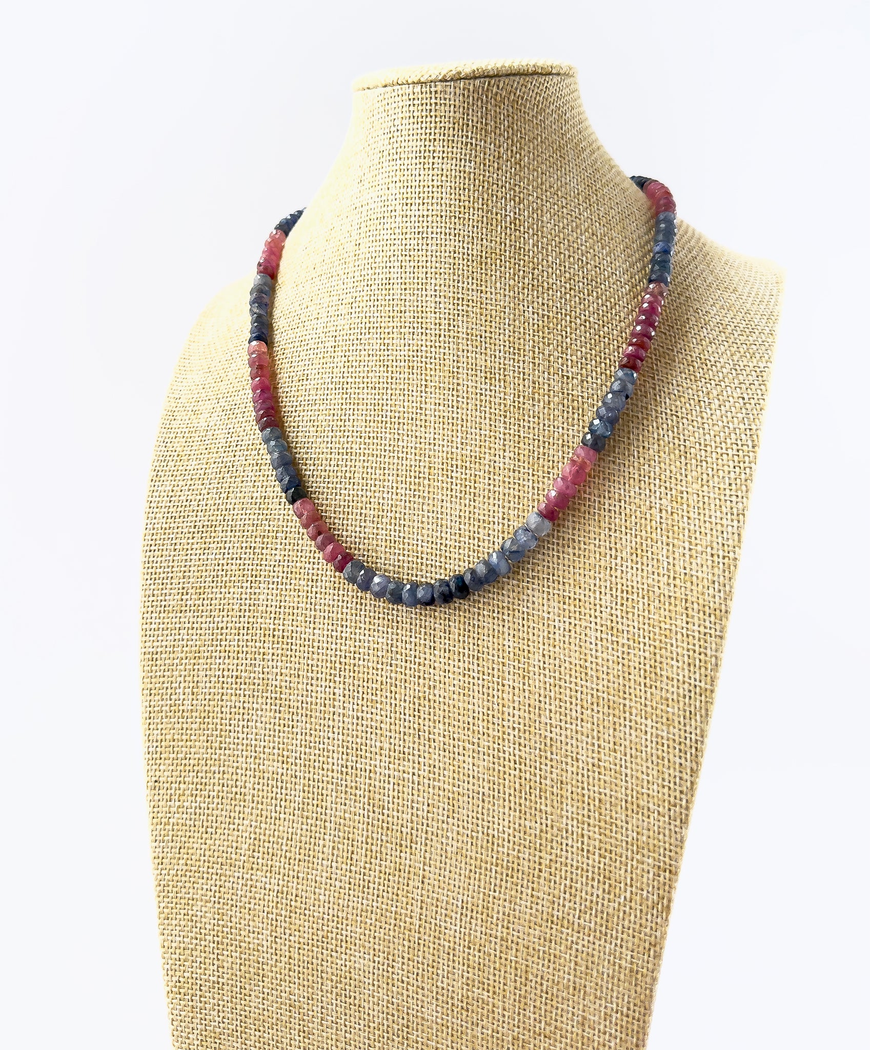 Genuine Ruby and Blue Sapphire faceted rondelle beads showcasing brilliant sparkle and rich colour in a 220‑carat necklace.