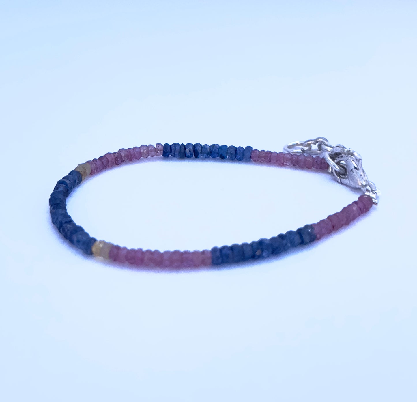 Elegant stone beads bracelet with 3.5mm faceted Ruby, Blue & Yellow Sapphire and adjustable clasp. 
