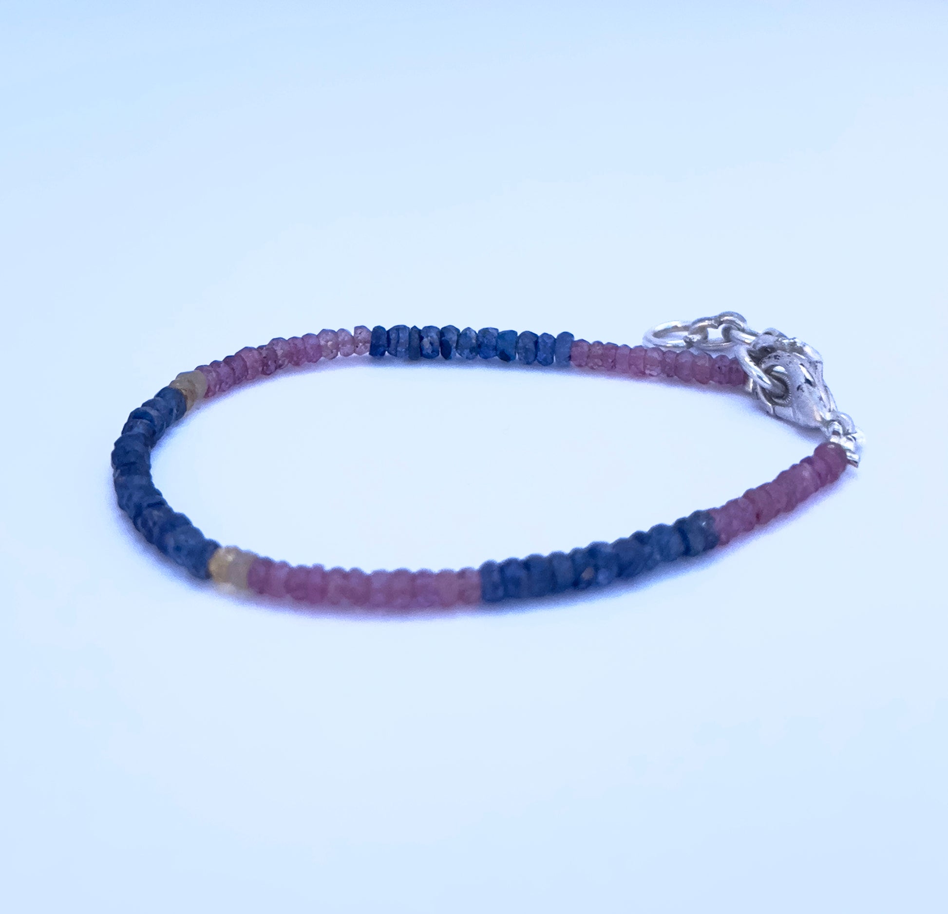 Elegant stone beads bracelet with 3.5mm faceted Ruby, Blue & Yellow Sapphire and adjustable clasp. 