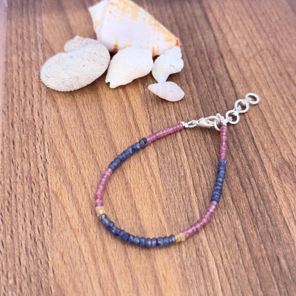 Faceted rondelle Ruby, Blue & Yellow Sapphire beads in 3.5mm size strung on a 17.5cm adjustable bracelet. 