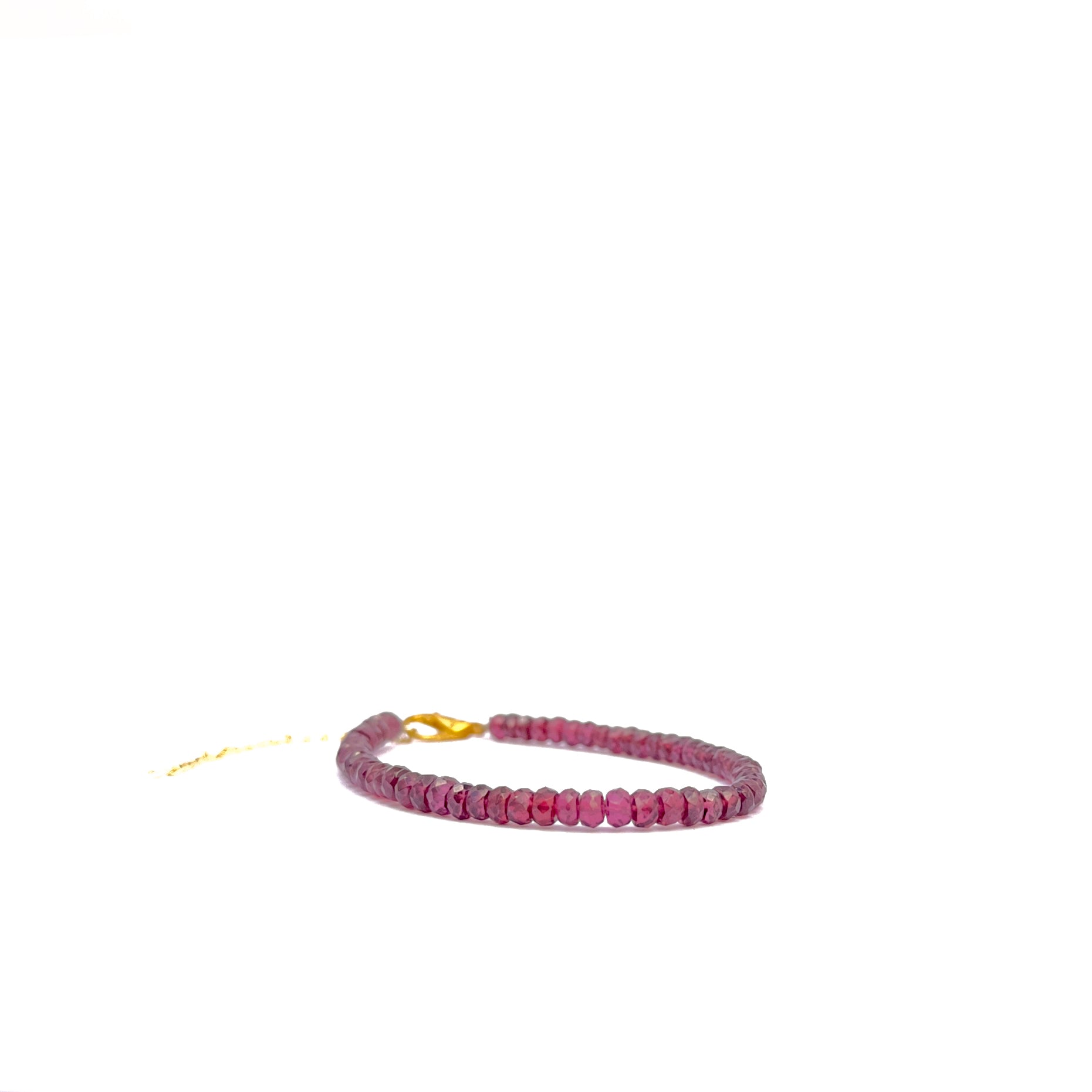 Natural Ruby bracelet featuring 4‚Äì4.2mm faceted beads in vibrant tones.